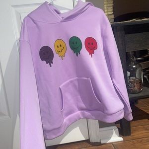 Purple, soft hoodie, never worn, just wasn't my style but it's very comfy :)